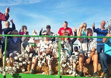 tourists enjoying hay ride