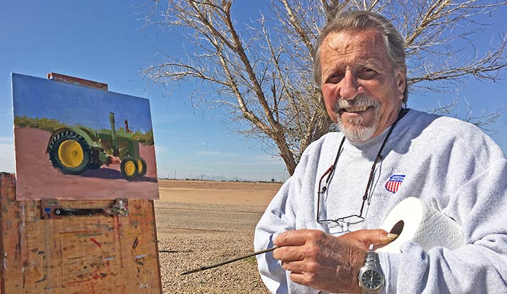 artist painting farm picture