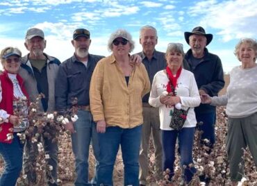 tour group in cotton field