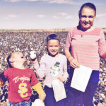 children displaying cotton bols